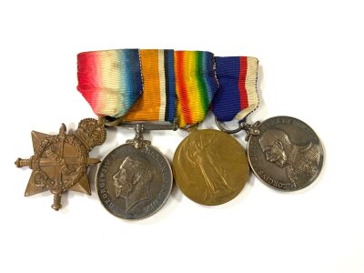 WW1 mounted group of 4, awarded to K.22064, A.V.WALLEDGE, STO, 1.R.N, 1914-18 star, 1914-18 War medal, Great War medal, Royal Fleet Long service medal.