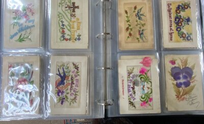 A collection First World War embroidered silk postcards.