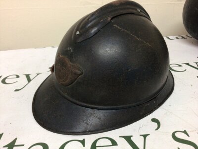 A Vintage French Fireman’s helmet.