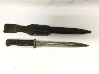 A German K98 bayonet and sheath.