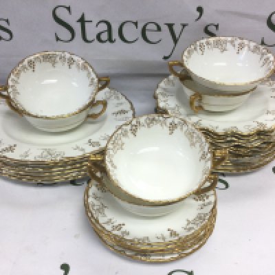 A collection of Royal Crown Derby plates and soup bowls in Vine pattern. Shipping category D.