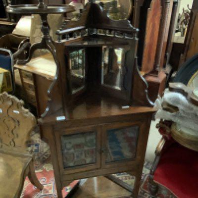 A small Rosewood veneered and mirror backed corner cabinet.. 147cm x 63cm- NO RESERVE