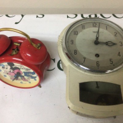 A Micky Mouse Alarm clock and a Smith white painted metal wall clock (2)