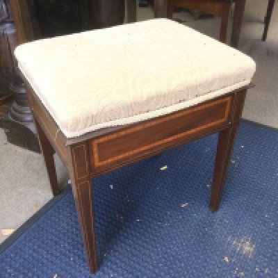 An inlaid mahogany piano stool. Shipping category D.