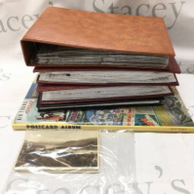 A collection of postcards in albums and some loose cards . Postage category B