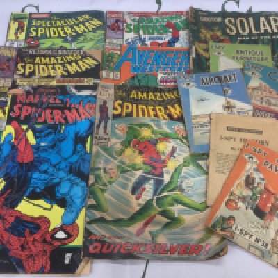 A small collection of vintage Marvel comics and I Spy magazines. Shipping category A.