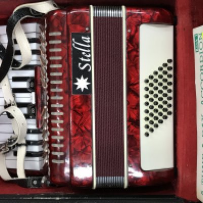 A Stella accordion in a fitted case, this lot cannot be posted- NO RESERVE
