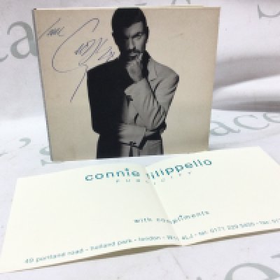 A signed George Michael Promo CD . Postage category A