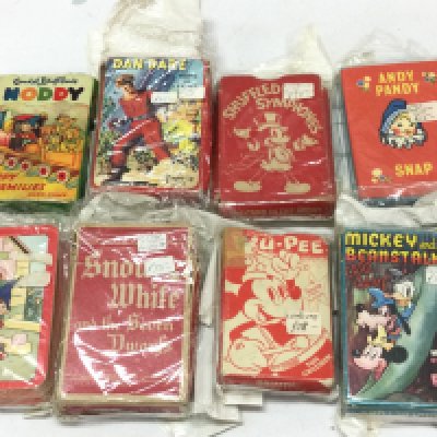 A collection of vintage playing cards Including Disney, Noddy, Dan dare etc. postage category B