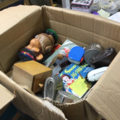 A box of mixed vintage items including a PG Tips monkey money box, Snow White jig saw puzzle, solar system toy etc. this lot cannot be posted