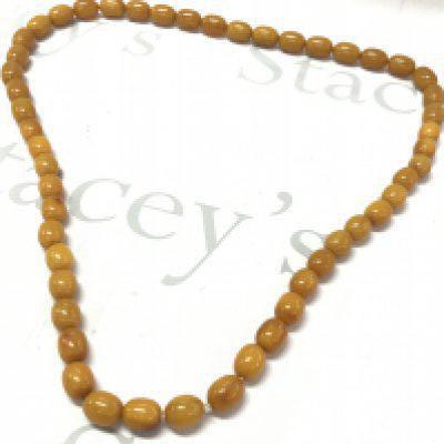 Butterscotch amber colour genuine Bakelite necklace , 108cm 210g . Postage category A- NO RESERVE