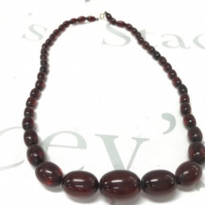 Cherry amber coloured Bakelite style necklace , 45g 65cm. Postage category A- NO RESERVE