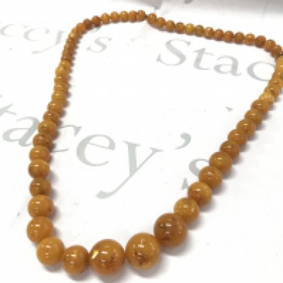 Extra large butterscotch amber necklace 175g 100cm. Postage category A- NO RESERVE