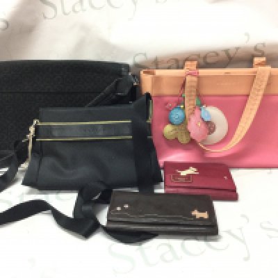Three genuine ladies Radley handbags and two Radley purses . Postage category C