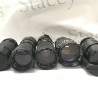 Five camera lenses including Sigma, Tele lenses, Tamron etc . Postage category C