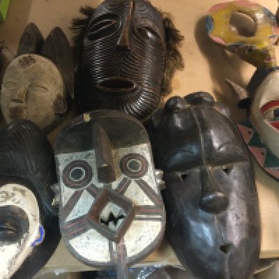 A collection of African tribal masks including Republic of Congo Bo Bo , Ivory Coast and Cameron.