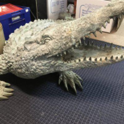 A large bronze water feature in the form of a crocodile .170 cm .