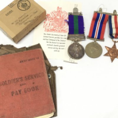 A GSM Palestine medal presented to 14730729 PTE.H.C.MORRIS OXF BUCKS, two WW2 medals and soldiers pay book. Postage category B