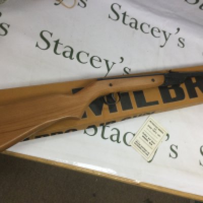 A boxed Milbro air gun and an Indian sword (2). Shipping category D.
