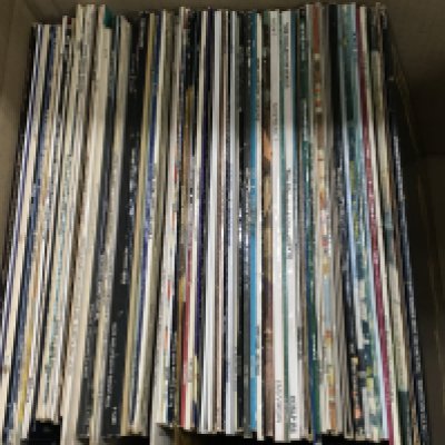 A collection of vinyl records including ABBA, Rod Stewart, Peter Frampton etc