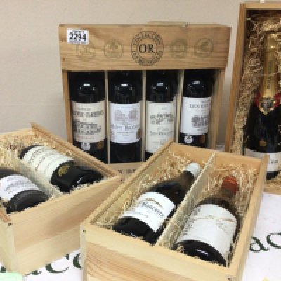 A collection of quality Vintage wines from the Bordeaux region and Saint-Emilio. some grand cru a bottle of Bollinger Champagne all well presented in wooden cases.