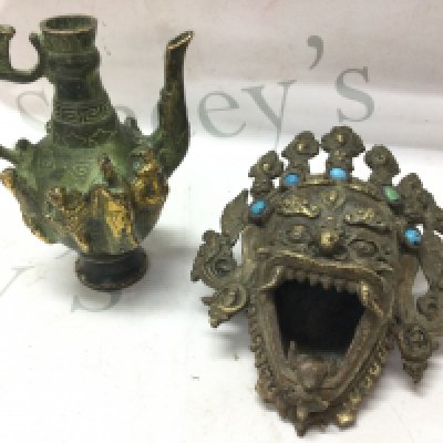 A Chinese bronze teapot (14cm tall) and a dragon mask (13cm wide) . Postage category B