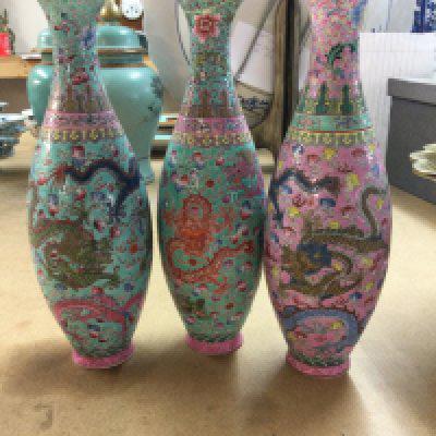 Three Republic vases decorated with dragons flowers foliage . 23 cm .