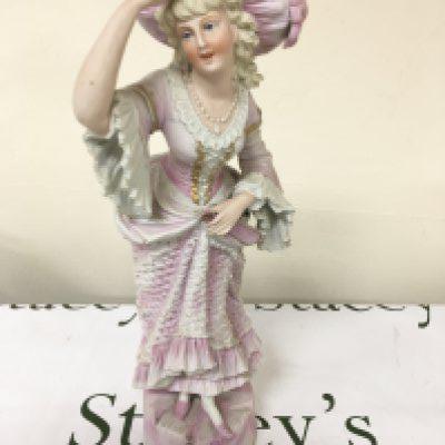 A Victorian Continental figure of a young girl in traditional dress Hight 44cm- NO RESERVE