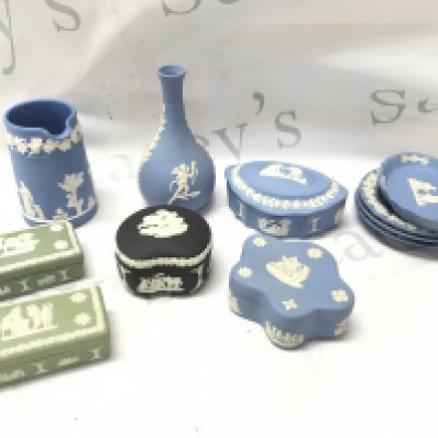A collection of various Wedgwood Jasper ware including a vase, trinket boxes, dishes . This lot cannot be posted