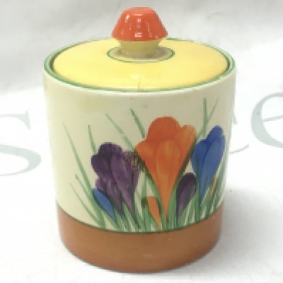 A Clarice Cliff crocus jam pot with a damaged cover