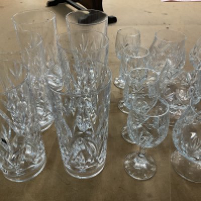 A varied collection of cut glass drinking glasses. (D)