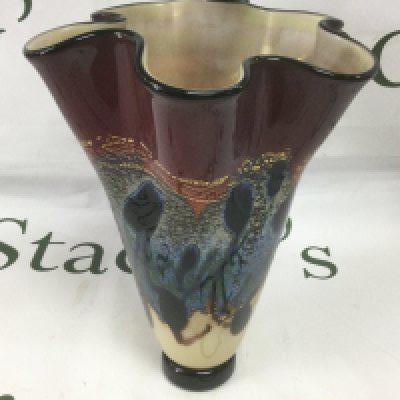 A Michael Nourot art glass vase with flared rim and a mottled iridescent glaze, approx height 22cm. Shipping category D.