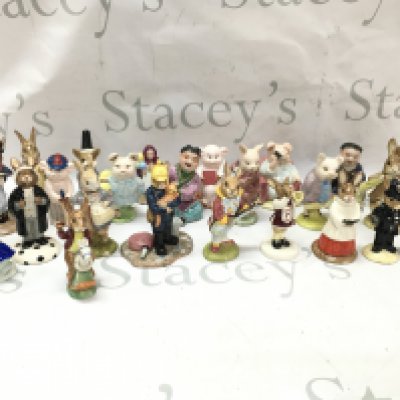 A collection of porcelain figures including Royal Doulton Bunnykins, Royal Albert Beatrix Potter . This lot cannot be posted