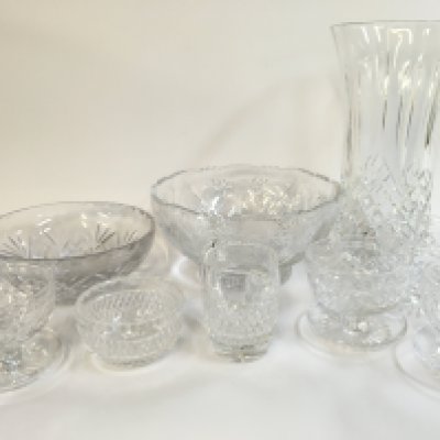 A Collection of lead crystal glass including a vase, bowls etc . This lot cannot be posted
