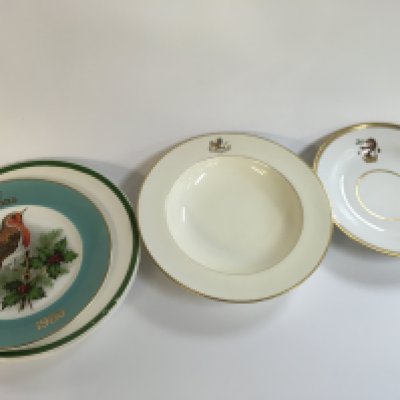 Christmas plates and two antique Minton 1885 armorial plates with lion . No reserve