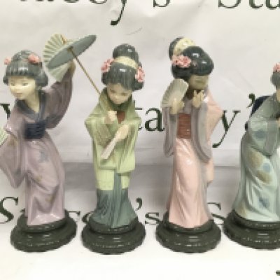 Four Lladro figures of geishas, approx height 29cm. Shipping category D.