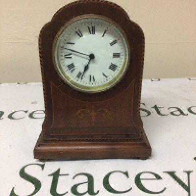 An Edwardian inlaid Mahogany mantel clock with a white enamel dial height 22cm- NO RESERVE