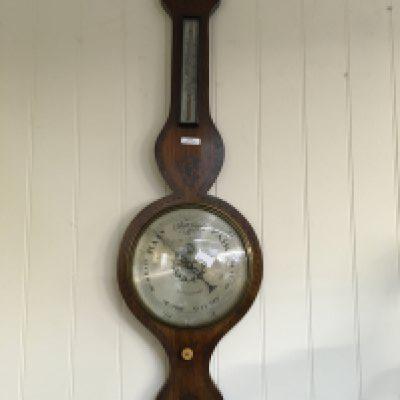 A Victorian rosewood barometer with brass inlay, with silver dial. Maker -Glazier Chelmsford. NO RESERVE