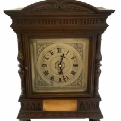 John Moore & Sons, Clockmakers, Clerkenwell, 15225, Oak cased silvered dial bracket clock single fusee movement, locking pendulum. Presented to Thomas Ruskin on the reconstruction of Billinsgate market 1784-1877. Height 51cm x Width 31cm x Depth 21cm. Together with wall bracket.