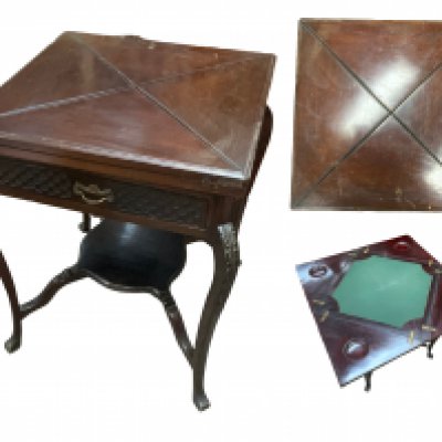An Edwardian walnut envelope card table. 57cm x 57cm x 71cm
