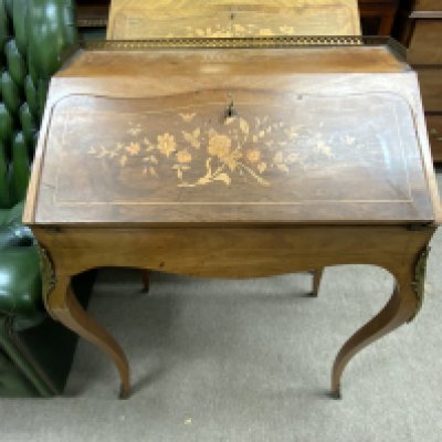 An inlaid french bureau 66cm wide 90cm tall 46cm