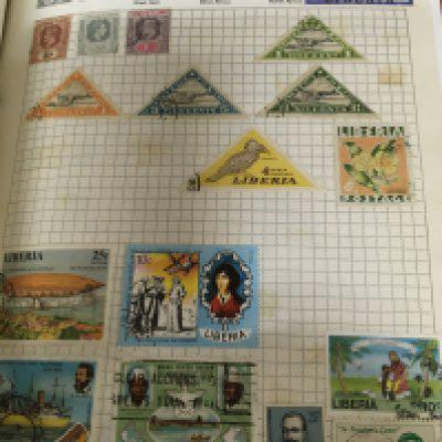 Two albums containing an A-Z of world stamps mainly used most second half of the 20th century a box containing a quantity of small stock books containing mixed stamps and a box of first day covers.- NO RESERVE