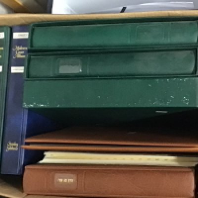 A box containing stamp albums. Including Many unused pictorial stamps Isle of Man Jersey Guernsey and others.- NO RESERVE