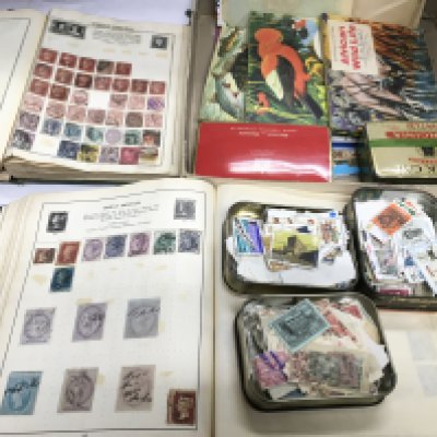 Two boxes of GB and world stamps including Penny reds plus some tea cards. Shipping category D.