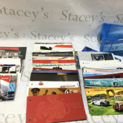 A box of presentation stamp packs. Postage B