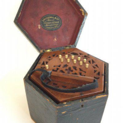 A Lachenal & Co Corcetina squeeze box 21 button boxed .
