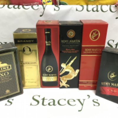 Six bottles of brandy and cognac including Remy Martin, Napoleon and Hine examples. Shipping category D.