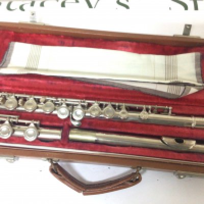 A chrome finished flute maker Artley Elkhart IND serial number 223554 in a fitted case and good condition.