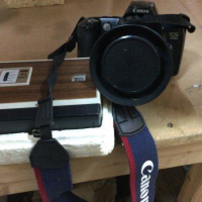 A collection of cameras including cannon .