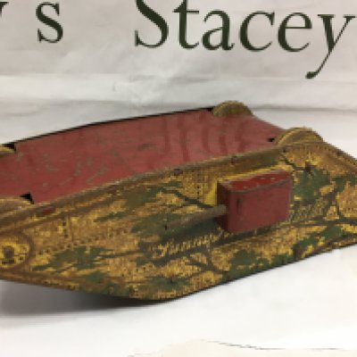 A vintage tin plate clockwork tank, approx length 36cm. Shipping category B.